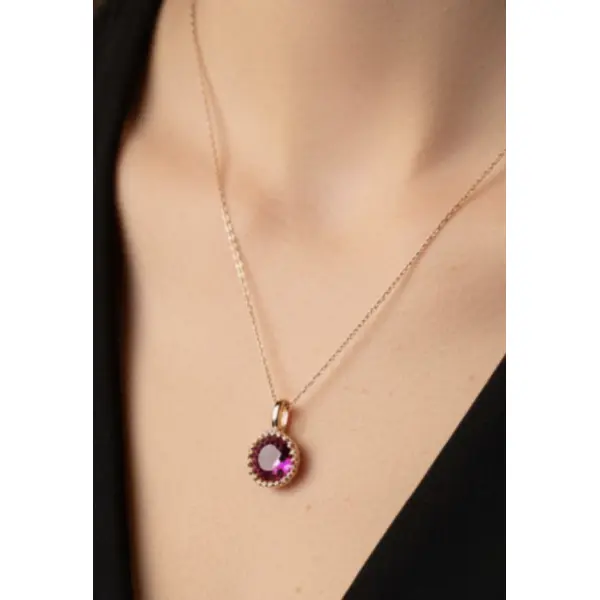 Pendentif secret pierre rouge or 18 carats