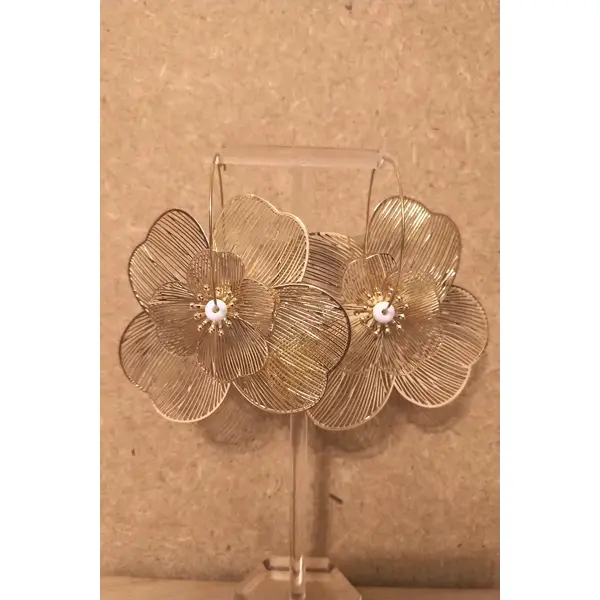 Boucles d'oreilles créoles florales acier inoxydable doré .