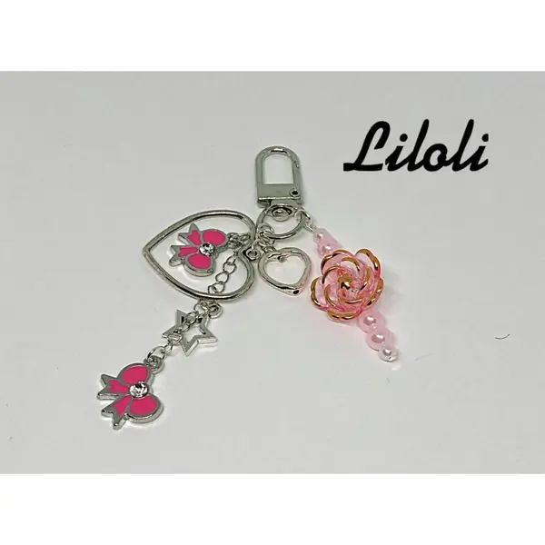 Porte clé / bijoux de sac noeuds roses